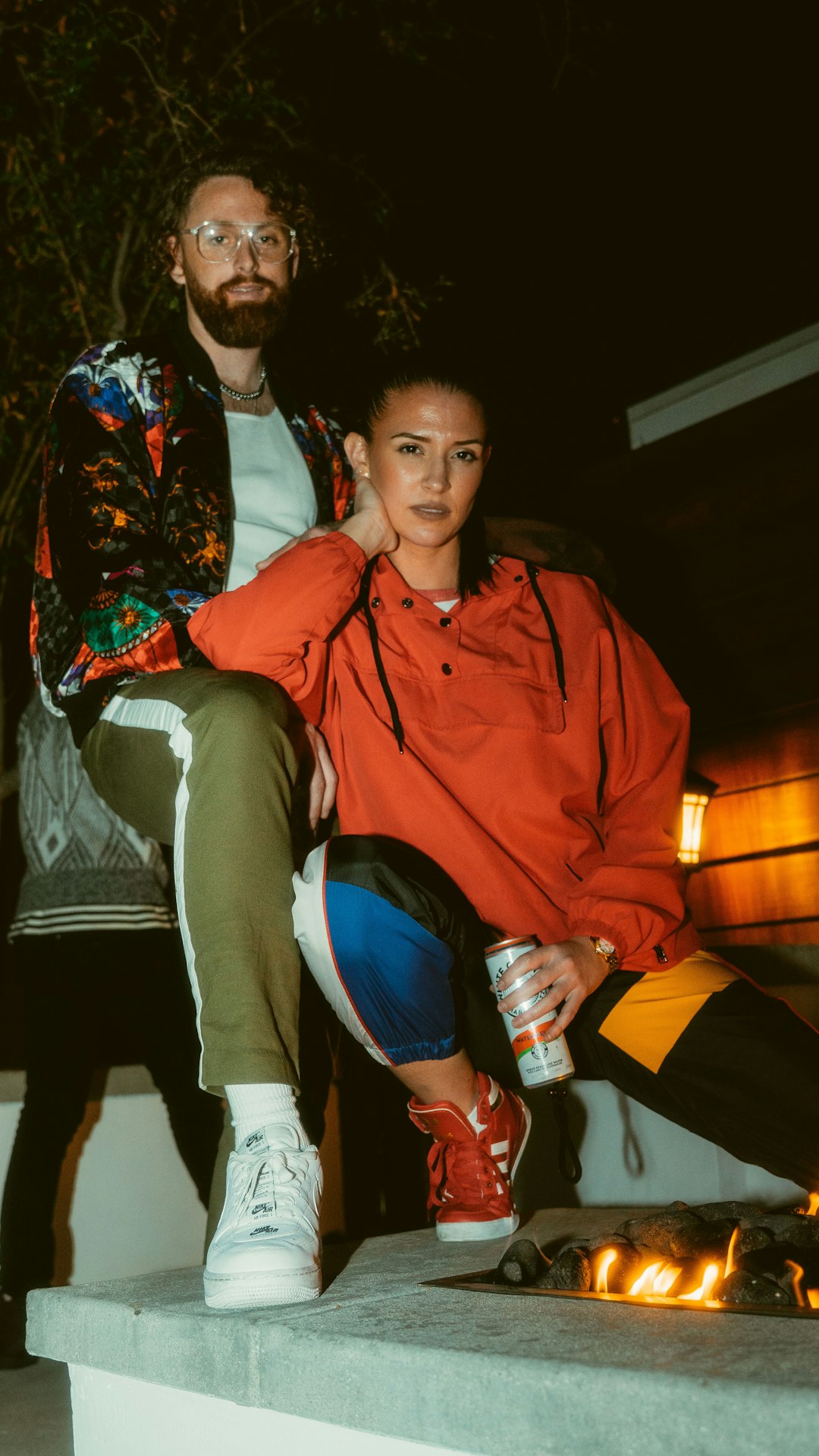 Stylist in fitting room arranging outfits